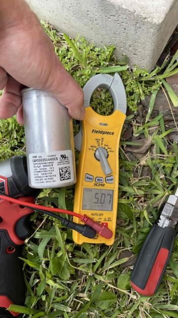 The customer had us out today to take a look at their compressor, which was not operating. We saw that it was on a start circuit error, so we tested the capacitor and found that it was low. We swapped it out, and the compressor started up again.