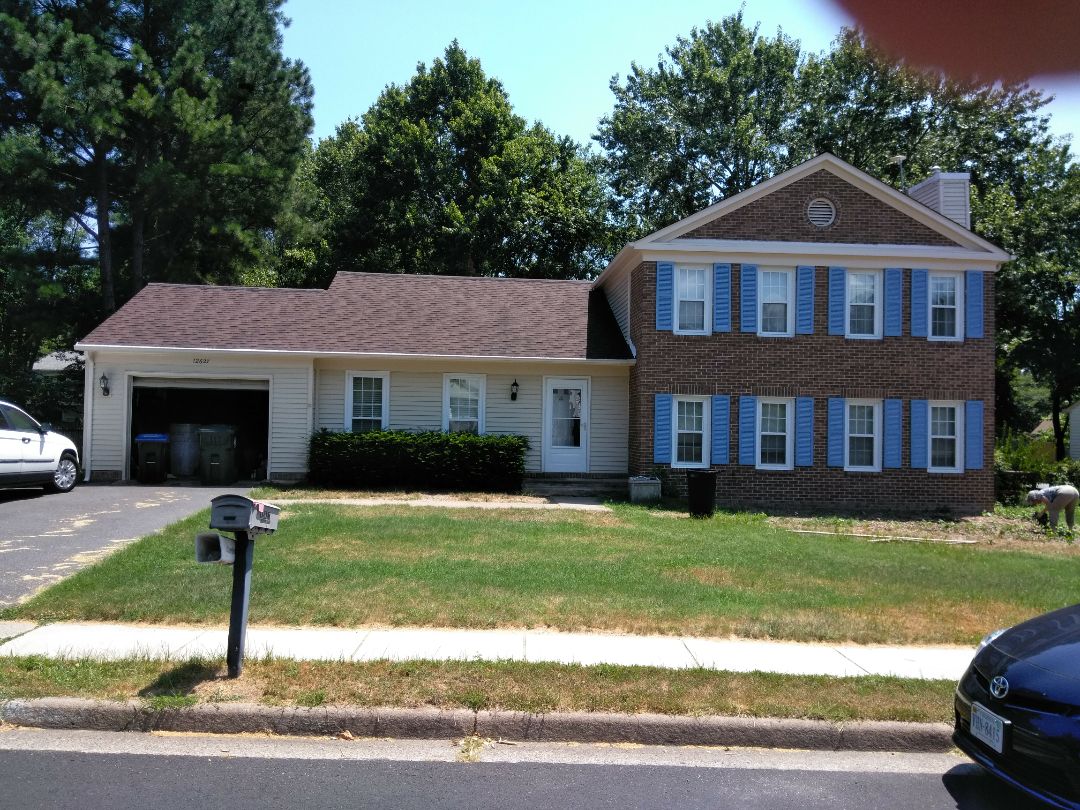 Herndon, VA - High wind and hail caused storm damage to the homeowners' roof, siding, and gutters. We replaced the roof with CertainTeed Landmark architectural shingles. We replaced the siding with Norandex Sagebrush Super Premium vinyl siding. We replaced the gutters with custom-made seamless gutters. Herndon, VA - High wind and hail caused storm damage to the homeowners' roof, siding, and gutters. We replaced the roof with CertainTeed Landmark architectural shingles. We replaced the siding with Norandex Sagebrush Super Premium vinyl siding. We replaced the gutters with custom-made seamless gutters.