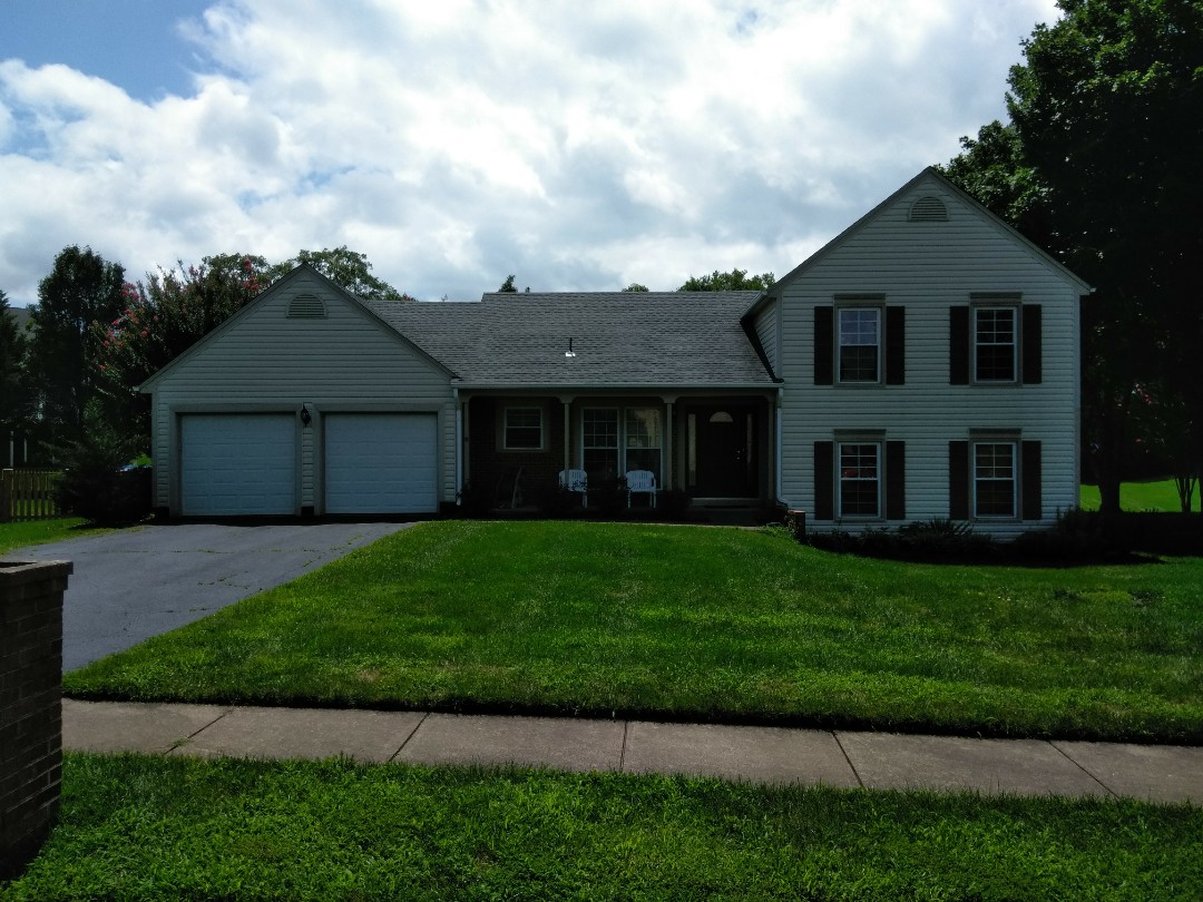 Herndon, VA - High winds with storm damage tore off some 3-tab shingles on this home and damaged the aluminum siding. We replaced the roof with CertainTeed Landmark architectural shingles and we replaced the siding with Norandex Sagebrush .050 Super Premium vinyl siding. Herndon, VA - High winds with storm damage tore off some 3-tab shingles on this home and damaged the aluminum siding. We replaced the roof with CertainTeed Landmark architectural shingles and we replaced the siding with Norandex Sagebrush .050 Super Premium vinyl siding.