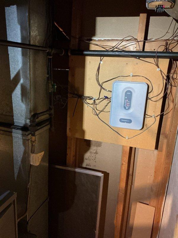 Successfully installed a Lennox ML196UH110XE60C furnace with riser box and 1620 media air cleaner in client's basement. Reconnected system to existing thermostat and verified proper operation of all components including control unit with digital display. All connections, ventilation, and drainage systems were properly secured and tested.