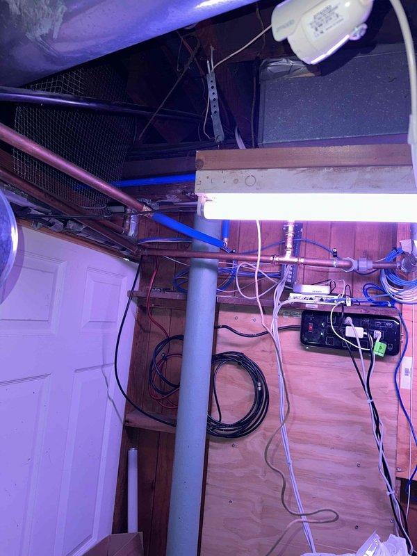Completed installation of water lines as specified in the approved quote. Installed color-coded PEX piping (red and blue) with proper securing to floor joists. All connections were tested with no leaks observed, and system is functioning correctly.