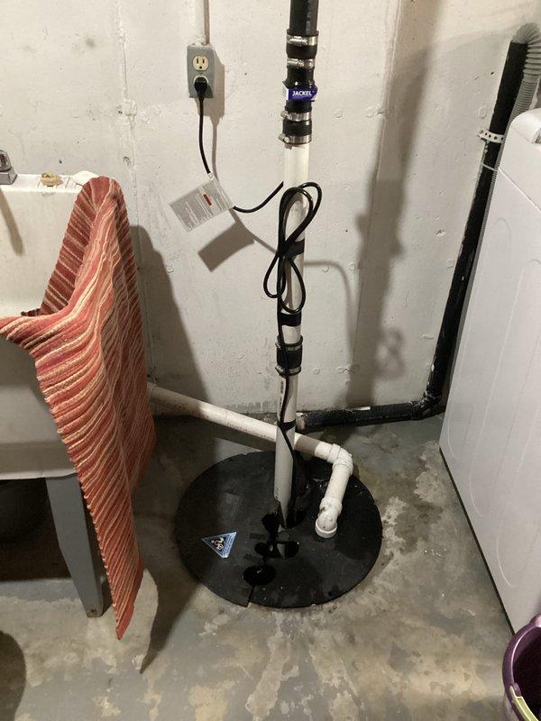 Replaced failed Liberty submersible sump pump in basement with new unit after diagnosing complete pump failure. System was non-operational despite proper power supply and no tripped breakers. Installed new pump, verified proper discharge through existing PVC piping system with check valve, and confirmed successful operation after installation.