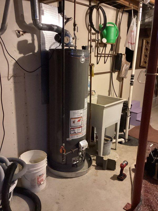 Responded to service call for 11-year-old water heater with non-functioning pilot light. Upon inspection of the Platinum model tank water heater, diagnosed faulty thermocouple preventing pilot ignition. Replaced thermocouple assembly, tested ignition system, and verified proper operation of unit before completing service.