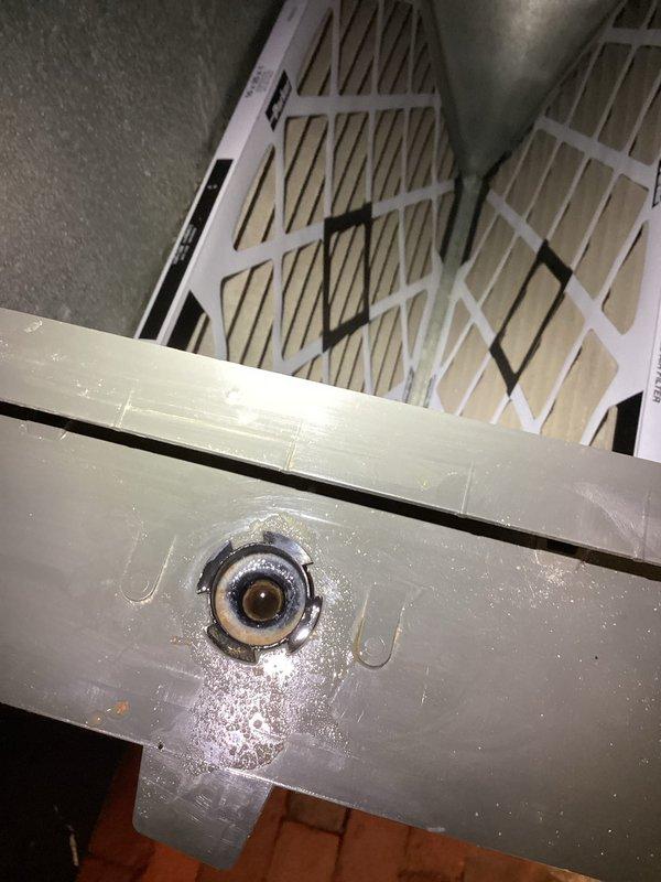 Cleared main drain line via cleanout by using cable to remove soft clog and flushed with hose to remove remaining debris. Found humidifier drain line clogged with rust and sand that could not be cleared, necessitating rebuilding of that section. System verified operational with proper drainage after service completion.