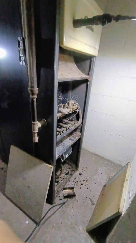 Responded to no heat call for aging furnace system. Upon inspection, identified severe flame rollout damage that had compromised essential wiring components. Repaired damaged connections and adjusted combustion system to eliminate rollout condition, restoring safe heating operation. Also inspected non-functioning water heater as requested by customer.