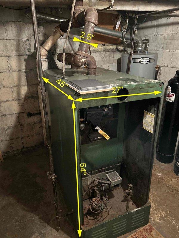 Conducted an on-site evaluation for boiler replacement in customer's basement. Current heating system is an aging green boiler (54"H x 45"W x 27"D) with deteriorating pipe insulation and visible signs of wear. Documented existing cast iron piping configuration and measured space for proper sizing of replacement unit. Customer interested in discussing financing options for new boiler system.