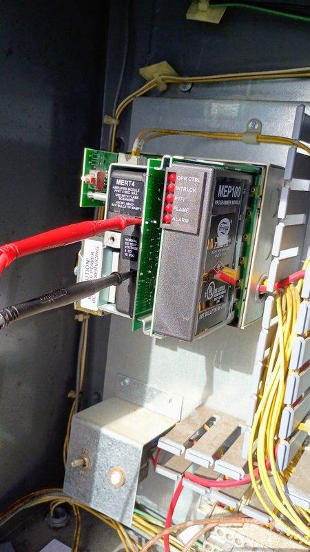 Replaced faulty MEP100 programmable controller module in the equipment control panel. Installation verified with proper connection of all wiring harnesses including the MERT4 circuit interface. Payment processed via customer's credit card on file.