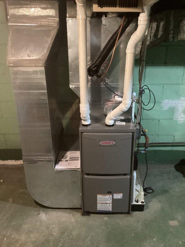Successfully installed a Lennox ML196UH045 furnace with Honeywell Home ProSeries T4 thermostat. Connected unit to existing return filter and completed all necessary PVC drainage and ventilation connections. System is functioning properly with proper ductwork sealing and electrical connections.