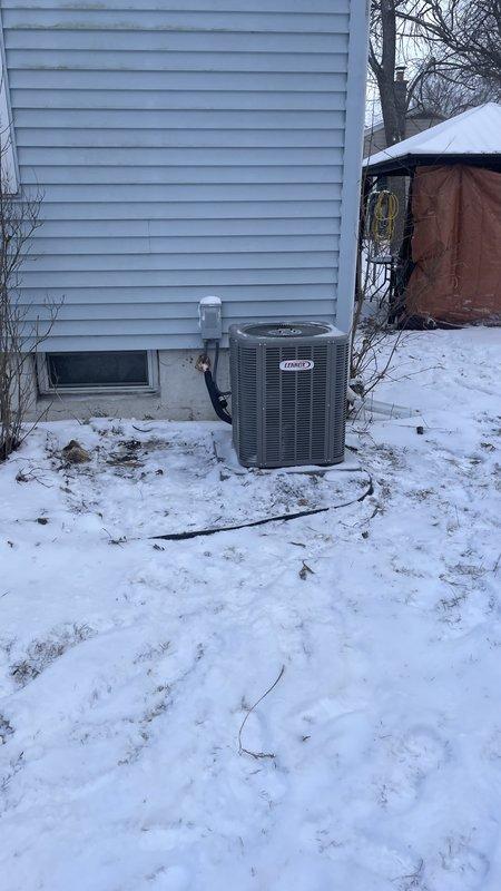 Successfully completed full HVAC system installation including Lennox ML196UH045 furnace, ML13KC1-024 condensing unit, CK40CT-30b cased coil, and AO Smith 40-gallon power vent water heater. Properly connected all components to existing return filter and thermostat, with outdoor unit positioned adjacent to foundation wall and all refrigerant lines properly installed.