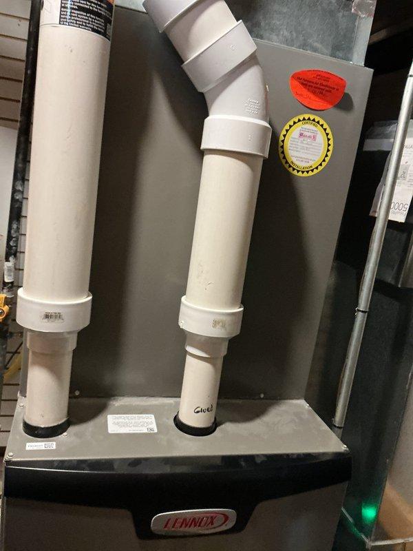 Diagnosed issue with 6-year-old Lennox furnace that was blowing cold air despite customer replacing thermostat batteries. Determined system was actually operational with green indicator light illuminated. Performed comprehensive inspection of the furnace, verified proper intake/exhaust ventilation through PVC piping, and confirmed heating functionality. Reset thermostat which resolved the "low battery" warning.