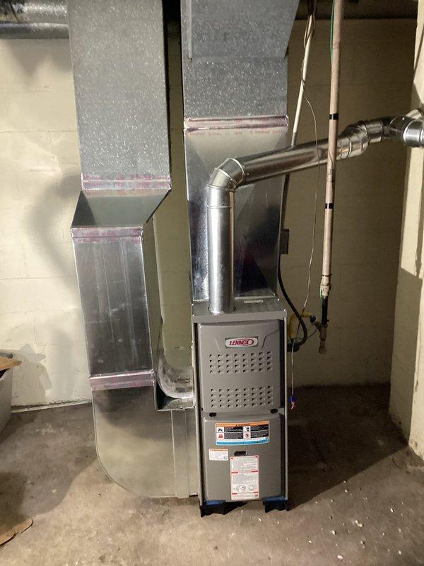Successfully installed a Lennox ML180UH045E36AK furnace with a 16x25x1 filter return elbow in residential basement. Rotated furnace and modified supply and return ductwork to accommodate "A" width furnace specifications. Installed new chimney liner and connected both water heater and furnace exhaust into liner using a wye fitting for proper venting.