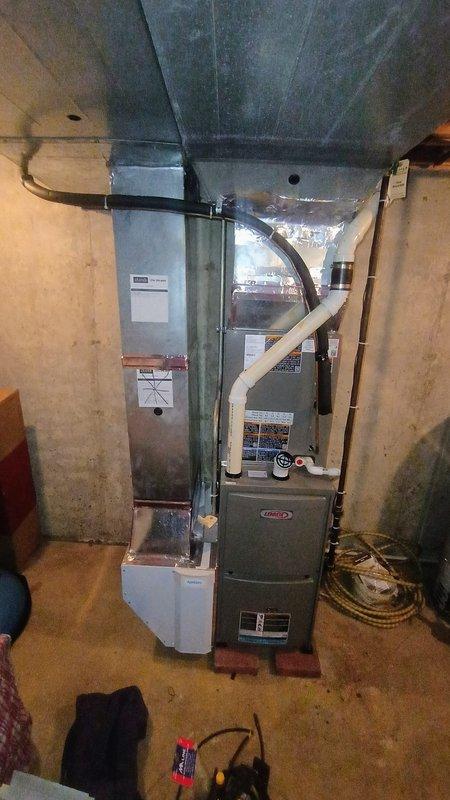 Completed removal and replacement of existing Marlo water softener system in basement utility area. Installation included new softener tank with digital control head, connection to existing copper piping system, and proper disposal of old equipment. System was successfully started up and tested after installation.