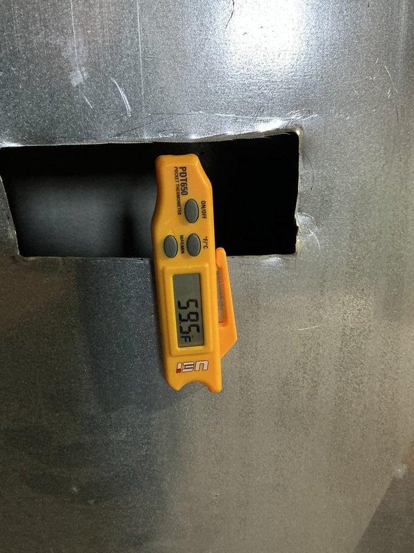 Completed warranty replacement of residential furnace in basement utility area. Installed new unit with proper ventilation system including PVC pipes and condensate drainage. Post-installation diagnostics confirmed system operating at 52.9° according to UEI measurement device.