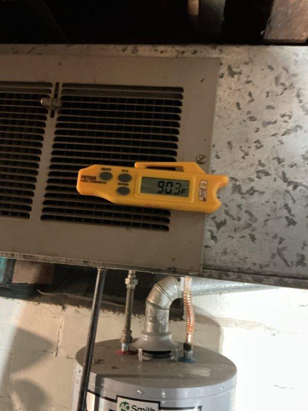 Successfully installed Lennox ML180UH045E36AK furnace with chimney liner and T4 thermostat, connecting to existing filter return system. System testing confirmed proper operation with supply air temperature reaching 90.3°F. Installation completed in basement utility area with all ductwork properly secured and connected.