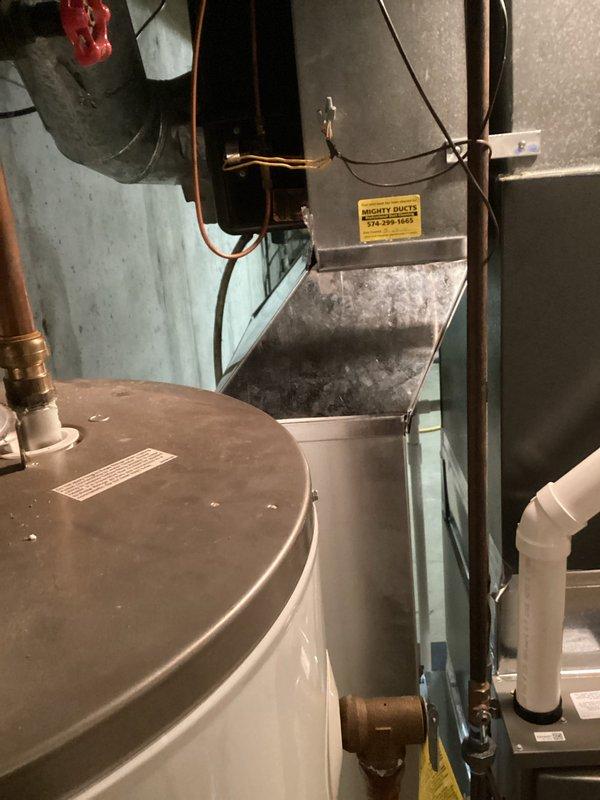 Successfully installed Lennox ML196 Furnace with 16x25x1 Filter Elbow and T4 Thermostat. System was properly connected to existing ductwork and all temperature readings were verified at 69.5°F using EDTECO digital measurement tool. Equipment is functioning as specified with proper airflow.