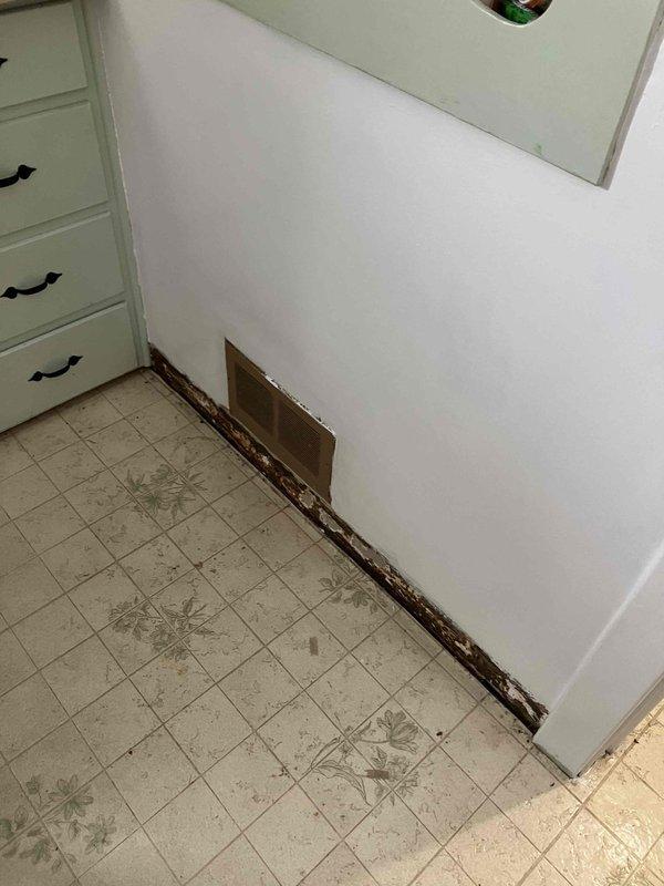 Conducted comprehensive assessment for two separate quotations: 1) Relocation of kitchen register currently positioned where new dishwasher installation is planned, and 2) Complete HVAC system replacement evaluation. Inspection revealed significantly aged existing HVAC equipment approaching end of service life. Crawlspace examination showed limited access conditions with exposed wooden joists showing signs of weathering. Customer interested in financing options for the system replacement.