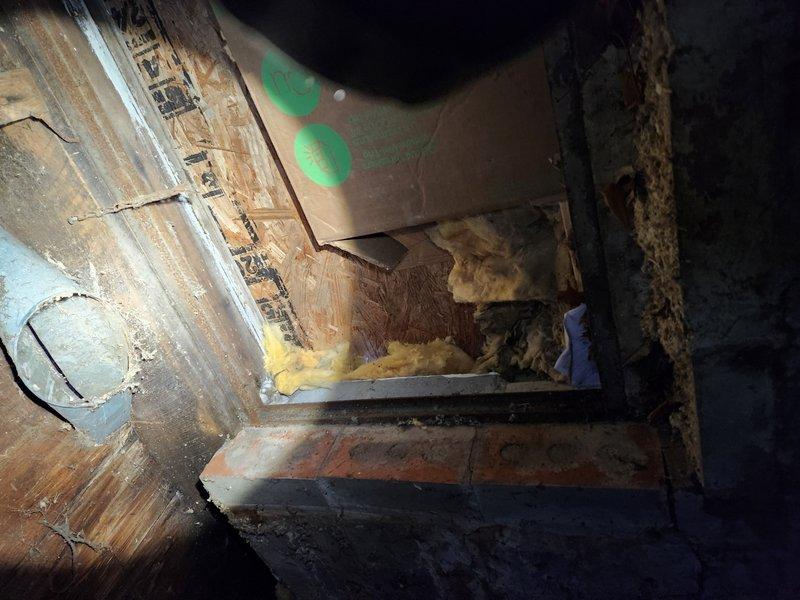 Conducted inspection for a whole home replumb project in a property being flipped. Documented significant plumbing infrastructure issues including severely corroded pipes and potential water damage within wall cavities. Assessment focused on complete plumbing system replacement needs for kitchen and both bathrooms.