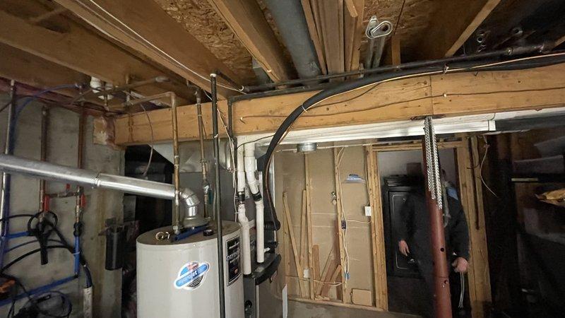 Completed full system replacement with installation of Lennox EL297 high-efficiency furnace and ML17 air conditioning unit, equipped with T6 WiFi thermostat for improved climate control. Modified ductwork by patching 20x8 return trunk, installing new 24x10 return drop, adding basement return with 8" duct components, and upgrading a 5' section from 12x8 to 12x10 duct with proper reconnection to existing 6" runs.