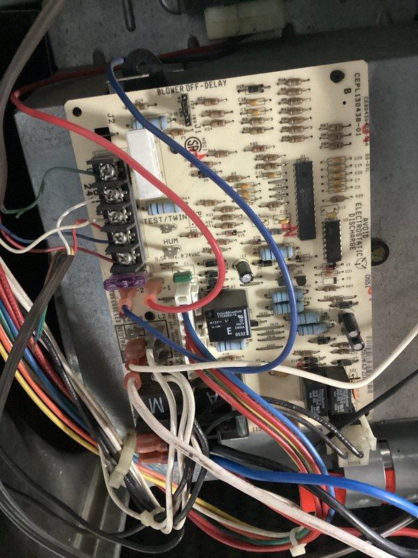 Responded to no heat complaint at residence, accessing via side door as requested. Upon inspection, found system was operational but not producing adequate heat. Examined control board and blower assembly, which showed normal operation with no visible damage. Performed diagnostic testing on electrical components and verified proper connections to terminal blocks. System is now functioning correctly and delivering appropriate heat levels.