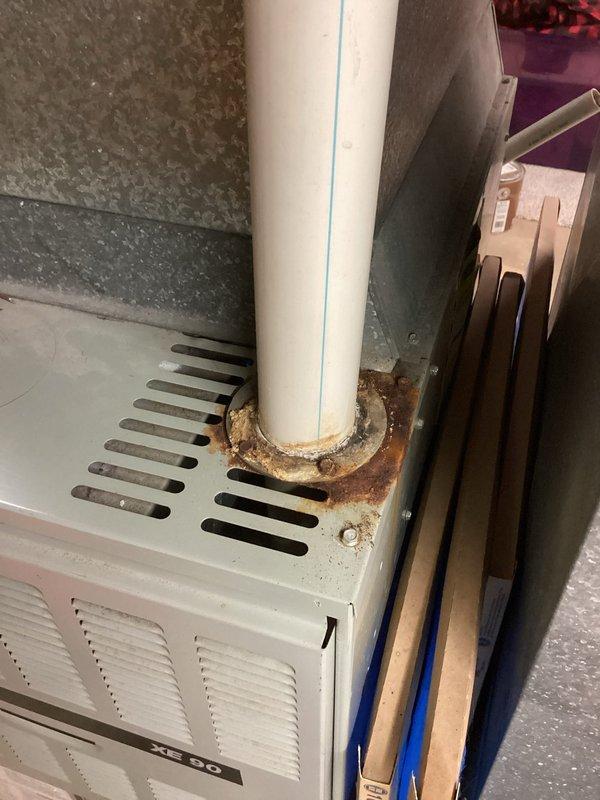 Performed annual maintenance on Diamond Single system for new maintenance member. Identified significant corrosion and rust at condensate drain connection requiring attention. Replaced damaged condensate trap component to prevent future water damage and ensure proper system drainage.