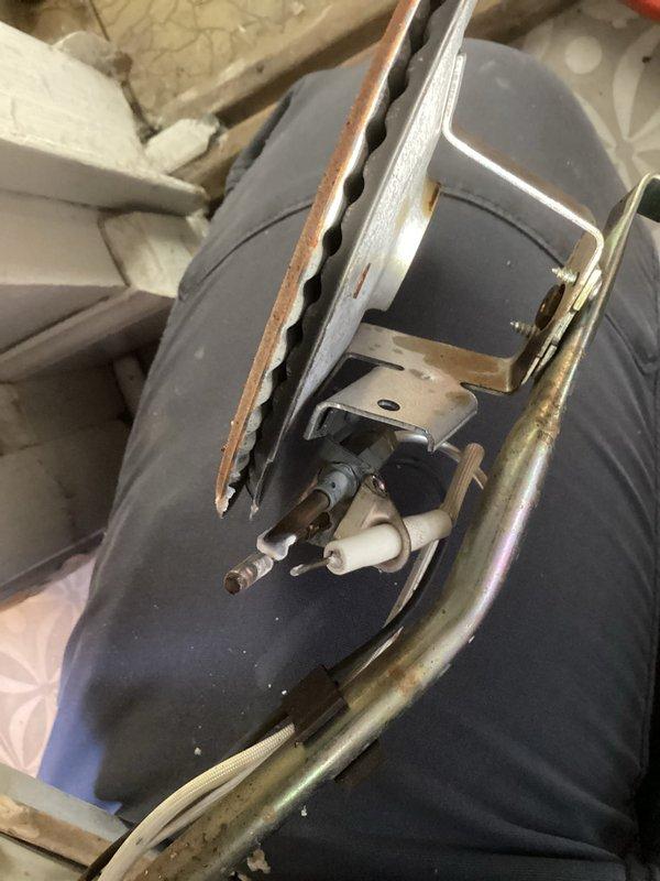 Responded to service call for 20-year-old water heater with pilot light failure. Inspected gas valve assembly and ignition system, which showed significant wear and corrosion on components. Replaced thermocouple and cleaned pilot assembly to restore proper ignition function, returning water heater to normal operation.