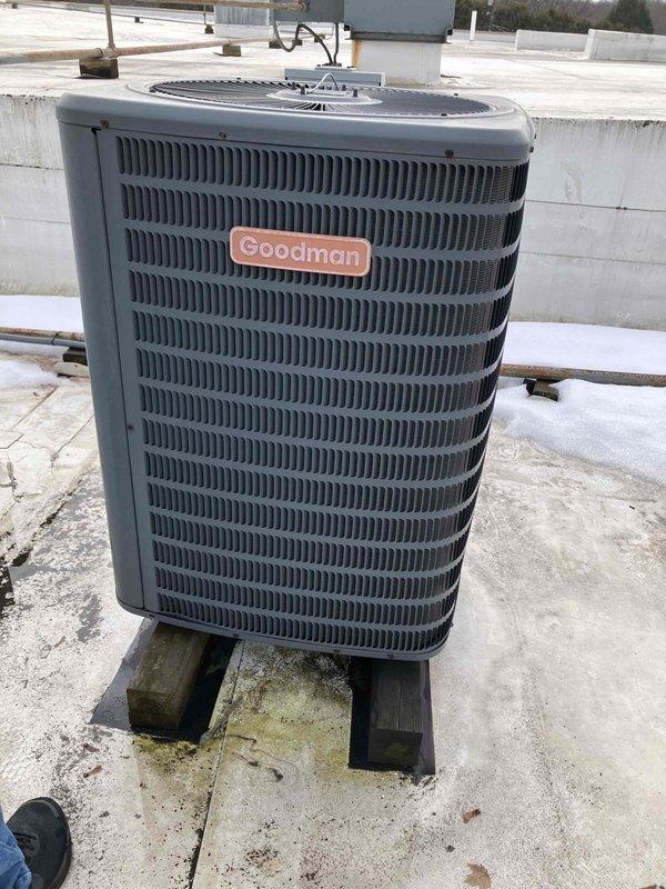 Performed follow-up estimate for replacement of aging 5-ton HVAC system serving kitchen area. Inspection revealed outdated Honeywell mechanical thermostat showing signs of wear and an existing Goodman rooftop unit installed on wooden supports. Customer reports system is non-operational and requires complete replacement.