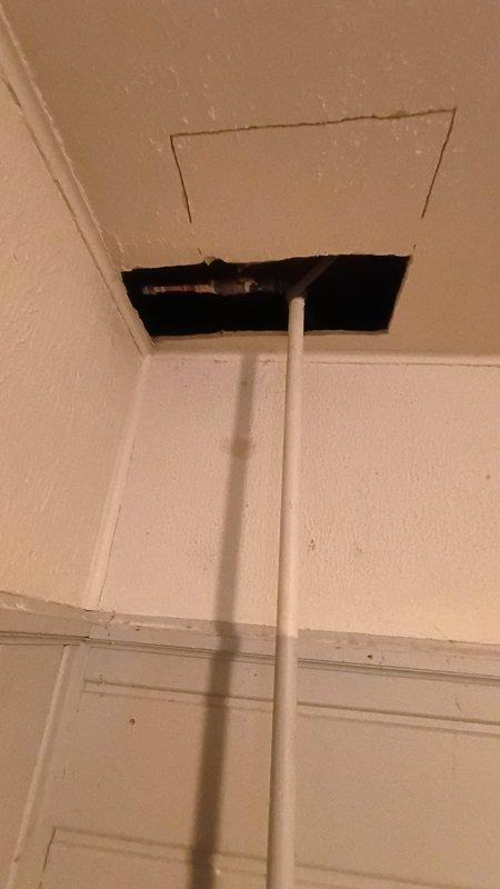 Accessed outdoor faucet through basement ceiling access panel to diagnose replacement needs. Inspected copper supply line connection to exterior wall-mounted hose bibb. Replaced deteriorated outdoor faucet with new unit, ensuring proper sealing at exterior wall penetration and secure connection to existing copper supply line.