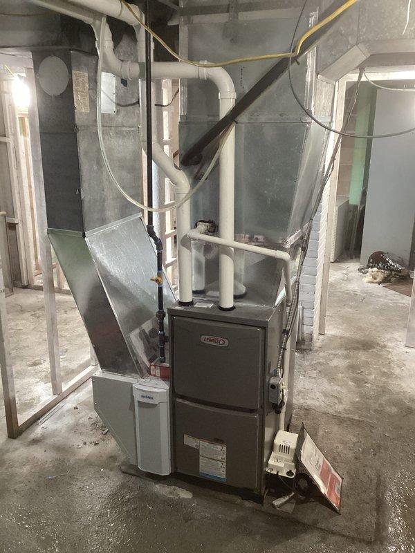 Successfully installed a Lennox ML196UH045XE36BK furnace with 1610 media air cleaner and T4 thermostat in basement utility room. Completed gas line installation from house penetration to furnace and installed new 2" PVC venting system, ensuring proper connections to existing ductwork.