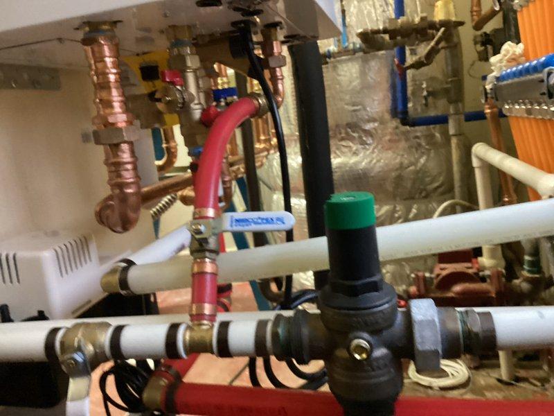 Responded to service call regarding water leak and gas leak concerns. Upon inspection of the mechanical room, examined complex plumbing system with copper and PVC piping network, pressure regulators, and associated valves. Identified and repaired leak in connection between copper supply line and pressure regulator valve, ensuring proper functionality of the building's water distribution system.