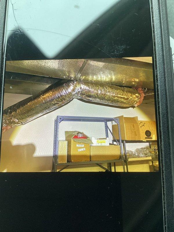 Responded to callback regarding customer dissatisfaction with IAQ installation. Inspected flexible ductwork installation in basement and found improper routing and inadequate sealing at junction points. Corrected ductwork positioning, sealed connections properly, and verified system operation to address customer's concerns.