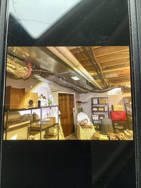 Responded to callback regarding customer dissatisfaction with IAQ installation. Inspected flexible ductwork installation in basement and found improper routing and inadequate sealing at junction points. Corrected ductwork positioning, sealed connections properly, and verified system operation to address customer's concerns.