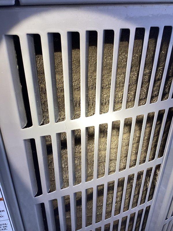 Performed monthly maintenance on single A/C PTU Gold Level system. Discovered significant dust accumulation on interior components and cooling fins behind ventilation grills. Thoroughly cleaned dust buildup and replaced 16x25x1 filter to restore proper airflow and system efficiency.