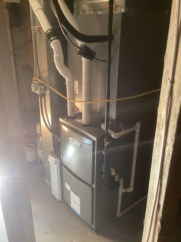 Successfully installed a new Lennox ML196 Furnace with 1410 Air Cleaner in utility room, including proper connection of PVC exhaust/intake venting system. Completed installation of four flex ducts and connected yellow gas line, ensuring all components were properly secured to wall studs and tested for optimal performance.