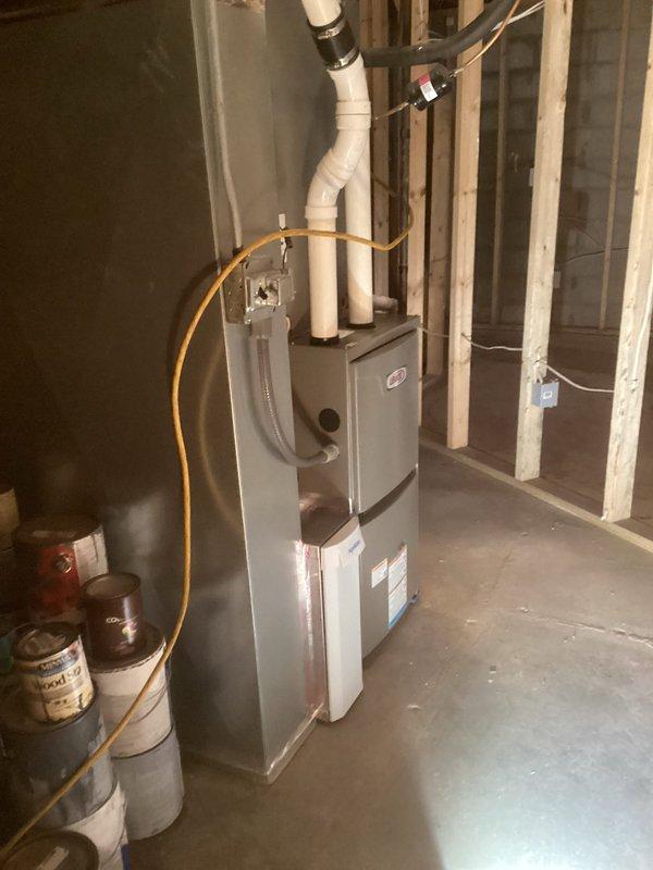 Successfully installed a new Lennox ML196 Furnace with 1410 Air Cleaner in utility room, including proper connection of PVC exhaust/intake venting system. Completed installation of four flex ducts and connected yellow gas line, ensuring all components were properly secured to wall studs and tested for optimal performance.