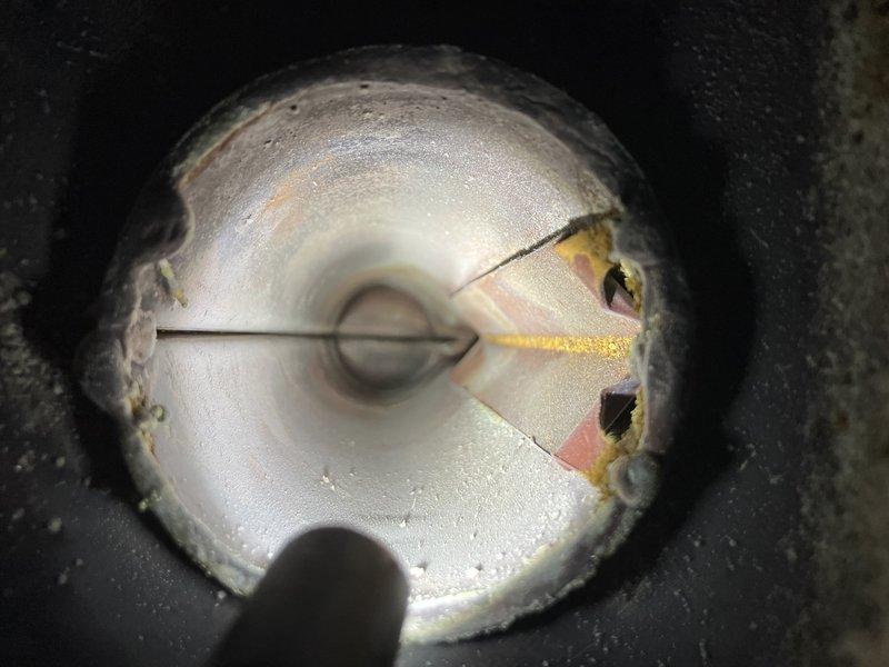 Diagnosed furnace with carbon monoxide leak and no heat production. Inspection revealed significant corrosion on heat exchanger with visible cracks and damaged metal components. Determined gas control valve failure was preventing proper heating operation; replacement valve installed and system tested for safe operation.