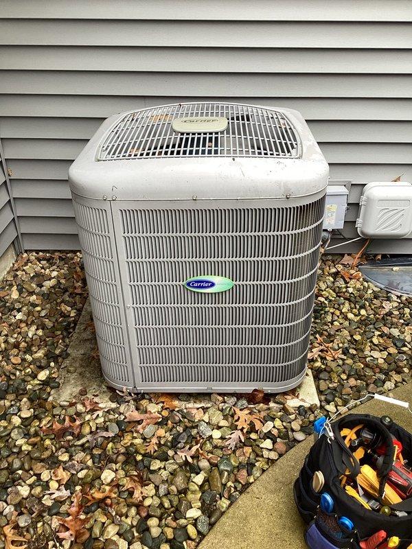 Performed scheduled maintenance on Carrier AC system per membership agreement. Inspected outdoor condenser unit and indoor air handler/furnace components for proper operation. System is functioning within normal parameters; indoor unit shows proper installation with intact connections and ductwork. Filter replacement (20x25x4) was not included in this service.