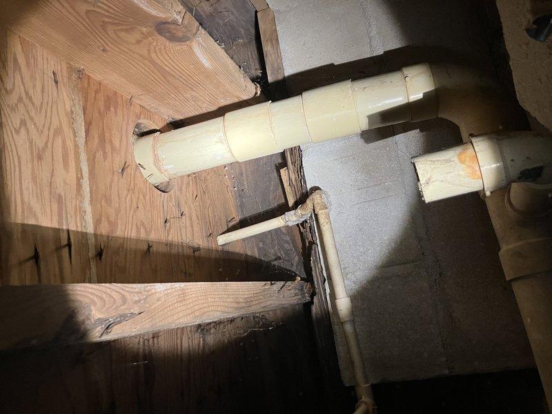 Removed customer's old toilet and installed new American Standard unit. Replaced broken shut-off valve and reconnected drainage system, ensuring proper connection to the existing PVC waste line that runs through the basement/crawl space. Verified installation was secure with no leaks after restoring water supply.