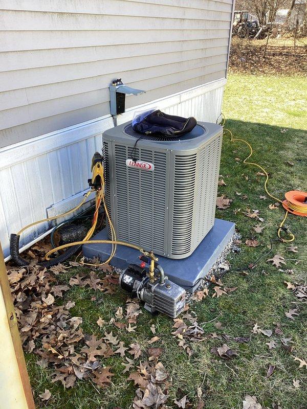 Completed installation of Lennox ML13KC1-024 condensing unit with ADP Manufactured home uncased coil and T4 thermostat. Set unit on concrete pad, ran refrigerant lines to home, and performed proper system evacuation and startup. Coil was special ordered from Mid City for this manufactured home application.