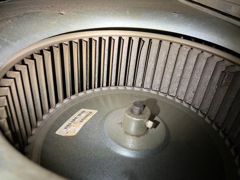 Responded to no heat call for 12-year-old system where unit was cycling off after brief operation. Diagnostic inspection revealed significant dust accumulation in the blower wheel assembly and deteriorated fiberglass filter panel. Cleaned blower wheel to restore proper airflow and replaced filter to prevent system overheating, resolving the intermittent operation issue.
