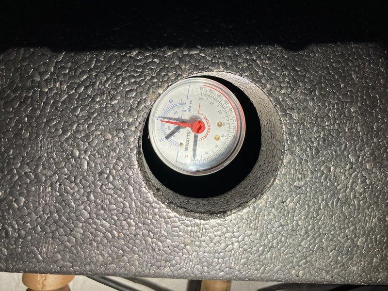 Responded to no heat call for 10-year-old gas boiler system. Diagnosed circulation issue causing only room temperature air distribution despite burner functioning properly. Restored proper water circulation through the system, verified correct operating pressure on gauge, and confirmed adequate heat output before completing service.
