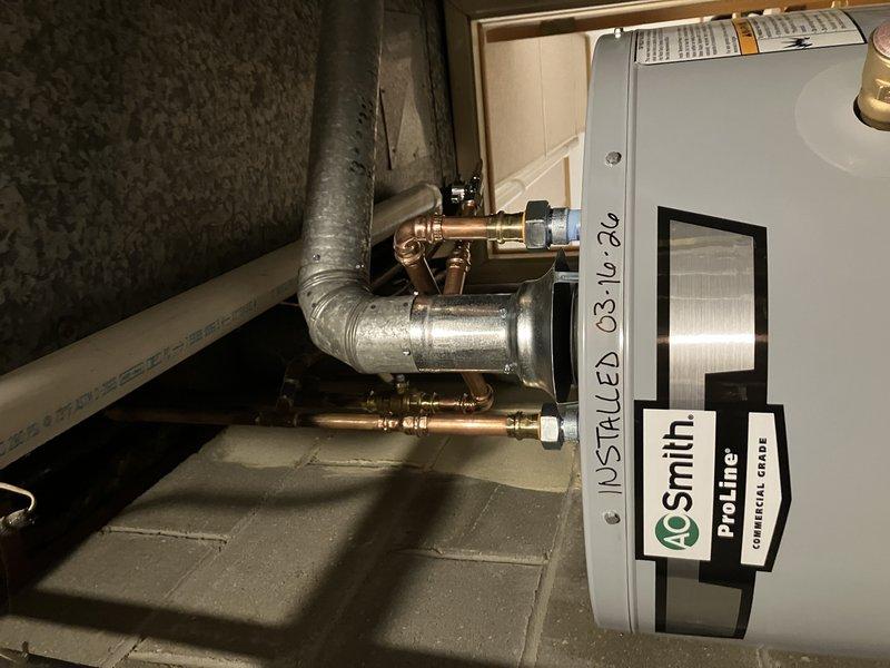 Successfully installed new A.O. Smith ProLine water heater per quote specifications, including all necessary copper pipe connections with brass fittings and valves. Additionally installed a sil faucet as requested, with all components properly fitted and tested for functionality.