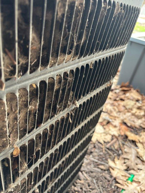 Performed scheduled A/C maintenance on residential unit, discovering severely clogged condenser coils that were restricting airflow and reducing system efficiency. Thoroughly cleaned and restored condenser coils to proper operating condition, significantly improving system performance and airflow. Customer's 16x25x4 filter not included in service.