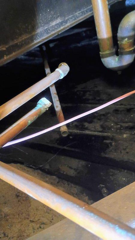 Responded to a service call back regarding no water flow to the home after customer restored water supply per previous instructions. Upon inspection, identified issue with copper supply lines and orange PVC pipe in the basement/crawlspace area. Repaired connection points at the brass fittings where flow was restricted and verified proper water pressure restoration throughout the home.