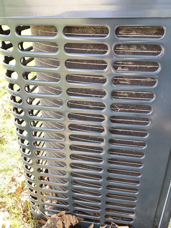 Performed scheduled A/C maintenance on residential system, including inspection of outdoor condenser unit. Observed some dust accumulation on condenser coils, which was cleaned to maintain proper airflow and system efficiency. Replaced standard 14x20x1 air filter as part of routine maintenance protocol. All connections and mounting hardware for exterior components were verified secure, including the weatherproof electrical connections and insulated refrigerant lines.