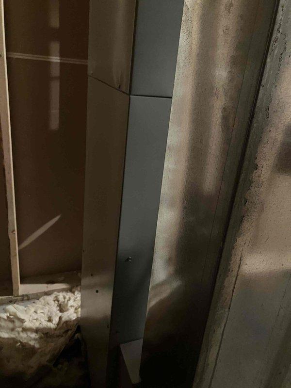 # HVAC System Replacement Estimate

Responded to service call for 23-year-old residential HVAC system with complete furnace failure. Upon arrival, confirmed no airflow through vents, no breaker trips, and furnace not operational. Conducted comprehensive assessment of existing heating and cooling equipment including outdoor condensing unit and interior ductwork system. Evaluated current system condition, noting age-related deterioration and end-of-service-life status of both heating and cooling components. Documented existing installation configuration including exterior AC unit location along building perimeter and interior furnace/ductwork arrangement in basement utility area. Photographed current equipment setup showing outdoor condensing unit with leaf debris accumulation and interior ductwork with exposed metal runs and structural framing. Prepared detailed estimates for two options: air conditioning replacement only and complete HVAC system replacement including both furnace and a