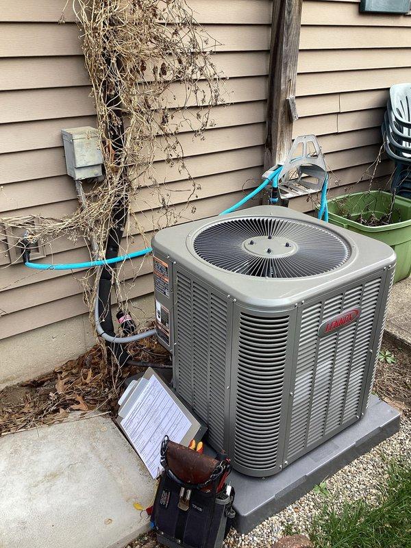 # HVAC Maintenance Completed

Performed comprehensive planned maintenance on Bryant outdoor condensing unit as part of annual cooling system service. Conducted thorough visual inspection of all accessible components with access panel removed to verify proper operation and identify potential issues.

Inspected electrical system including capacitor, relay, and all wiring connections. Verified capacitor mounting and terminal connections were secure. Confirmed proper wire management with zip ties maintaining organized routing of orange, red, yellow, purple, blue, and black conductors throughout unit. Checked relay operation and mounting integrity.

Examined refrigerant line connections at copper tubing junction points for signs of leaks or deterioration. Inspected condenser coil fins and fan assembly through top grille. Assessed unit positioning on concrete pad and verified adequate clearance around equipment.

Replaced 14x25x1 air filter per maintenance schedule. Documented unit condition