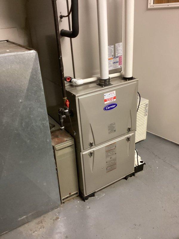 Responded to service call for suspected gas leak at propane furnace. Performed comprehensive gas leak detection and pressure testing on Carrier furnace system and associated gas piping. Inspected all gas connections, valves, and fittings throughout the system with particular attention to areas near the meter that had previously been serviced by the utility company. Conducted pressure test on gas lines to verify system integrity and confirmed no active leaks present at furnace unit or connected piping. All connections tested within acceptable parameters and system operating safely.