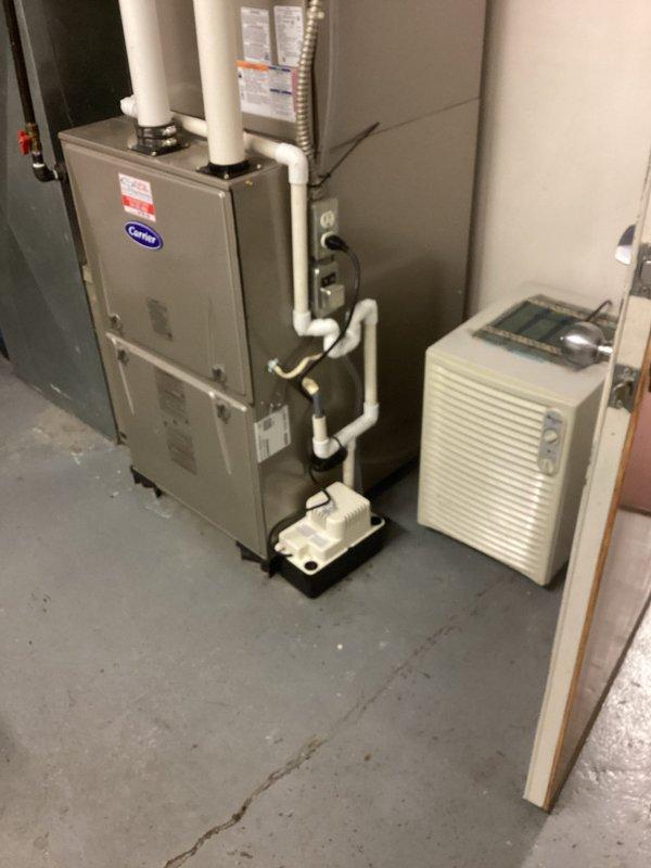 Responded to service call for suspected gas leak at propane furnace. Performed comprehensive gas leak detection and pressure testing on Carrier furnace system and associated gas piping. Inspected all gas connections, valves, and fittings throughout the system with particular attention to areas near the meter that had previously been serviced by the utility company. Conducted pressure test on gas lines to verify system integrity and confirmed no active leaks present at furnace unit or connected piping. All connections tested within acceptable parameters and system operating safely.