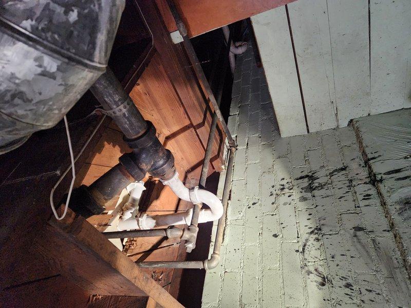 Responded to a tub drain blockage that had persisted for over 10 days despite homeowner attempts to clear using manual snaking and plunging. Accessed the drainage system through the basement utility area to inspect the plumbing configuration and identify the obstruction point. Successfully cleared the severe blockage in the shower/tub drain line, restoring proper drainage flow and eliminating the slow-draining condition.