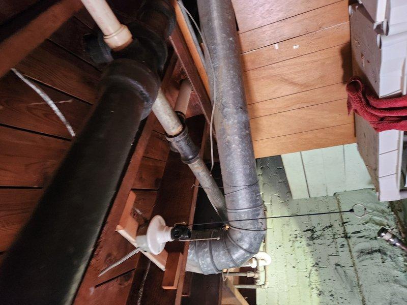 Responded to a tub drain blockage that had persisted for over 10 days despite homeowner attempts to clear using manual snaking and plunging. Accessed the drainage system through the basement utility area to inspect the plumbing configuration and identify the obstruction point. Successfully cleared the severe blockage in the shower/tub drain line, restoring proper drainage flow and eliminating the slow-draining condition.